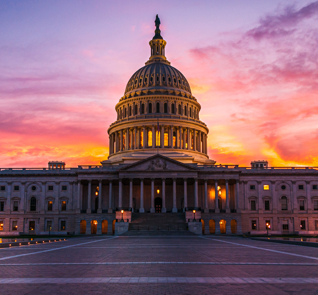 The capital dome illuminated after dark in Washington DC.